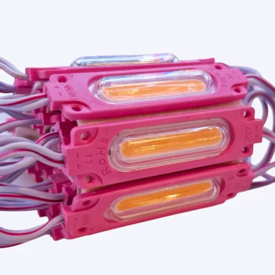 MODULO COB PEQUEÑO TRANSPARENTE 12V REF 7620 2W LUZ ROSADA